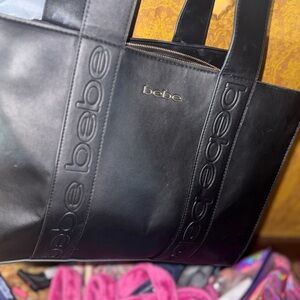 Bebe bag nwt
offer